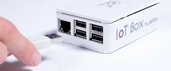 Odoo IoT Box connected via USB for device and sensor management